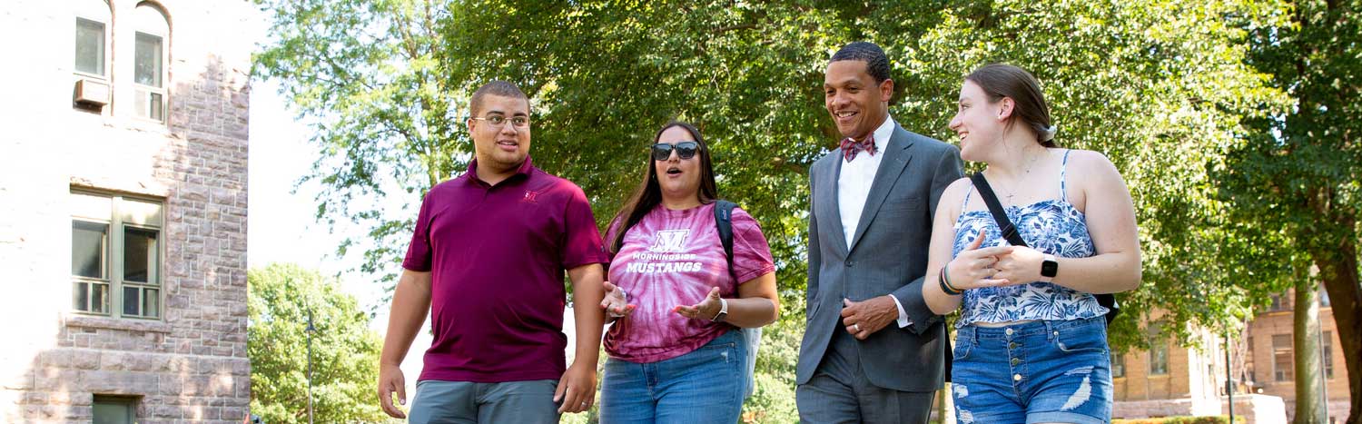 President Mosley Walking With Students