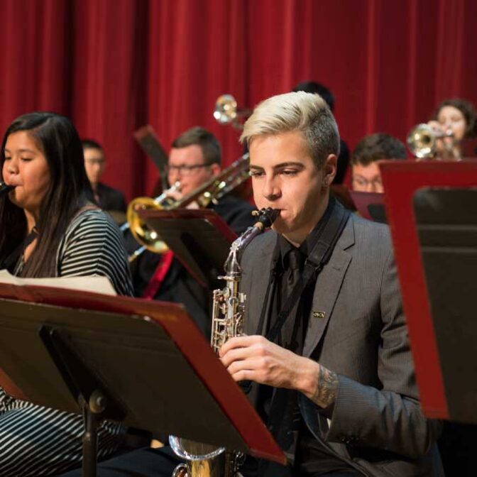 Student playing saxophone