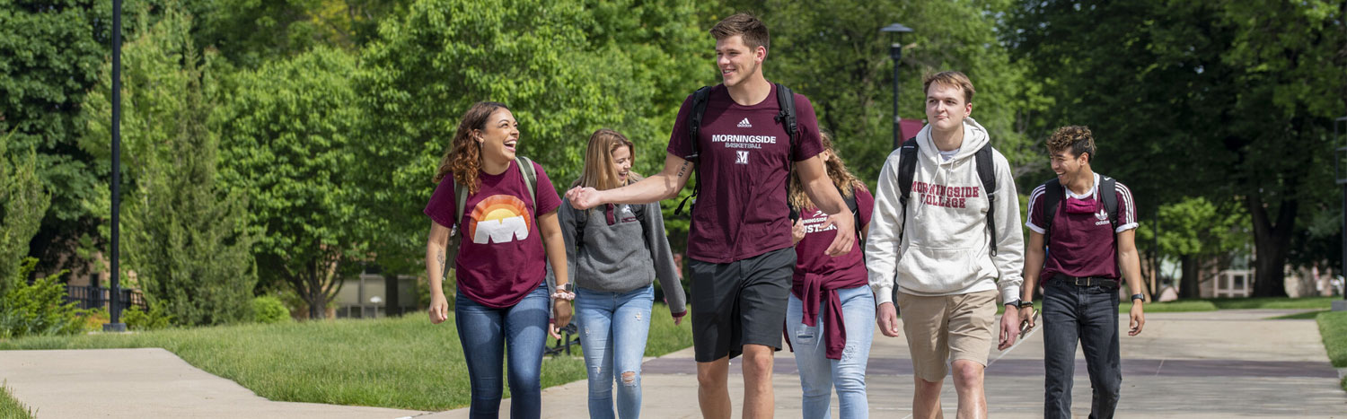 Students Walking On The Campus Mall