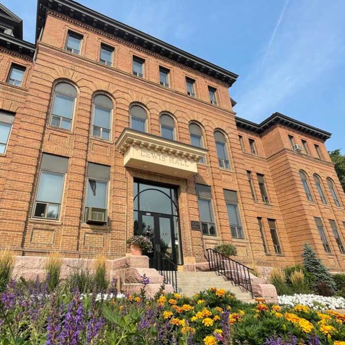 Lewis Hall With Purple Flowers Out Front