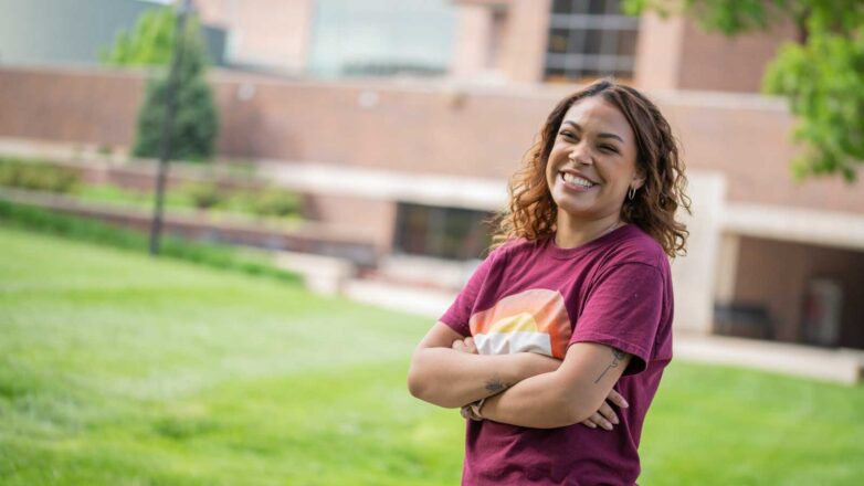 Student in front of library