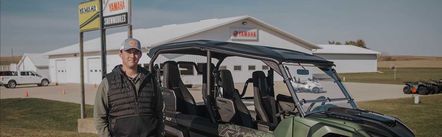 Ag Student In Front Of Dealership