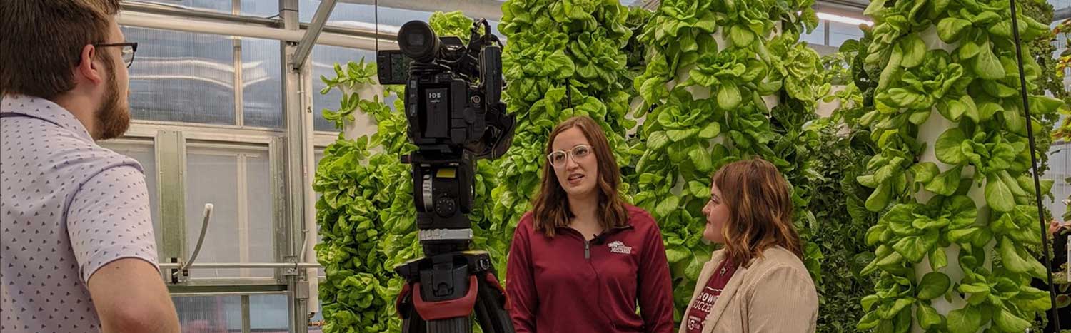 Ag Student Talking To Media