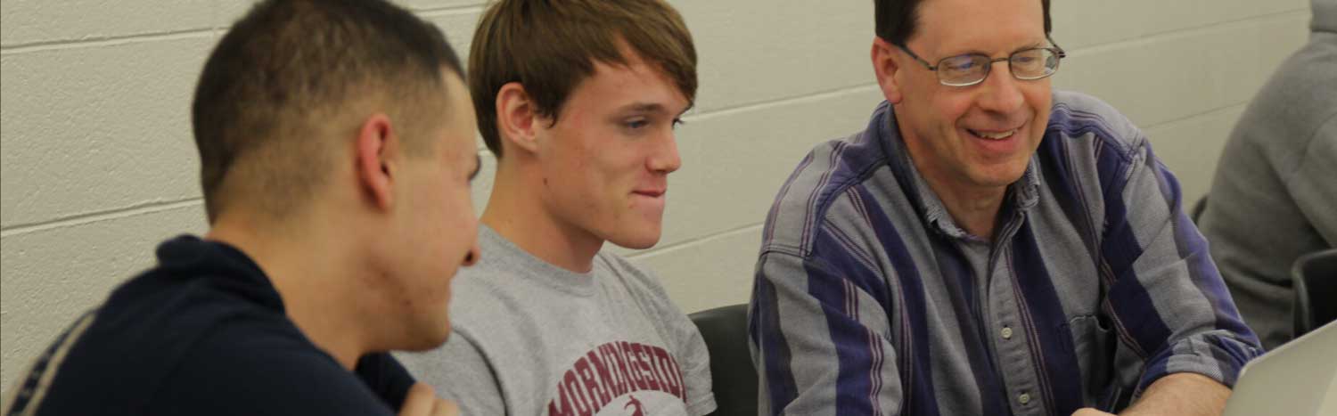 Computer Science Professor With Two Students