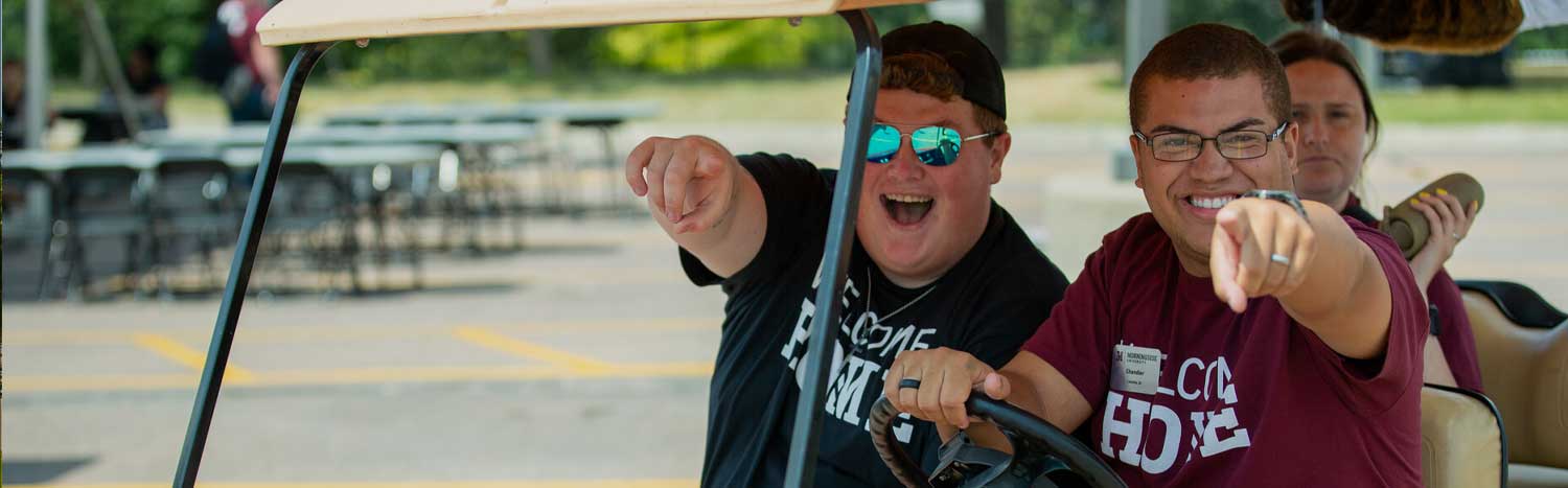 Students On Golf Cart Pointing