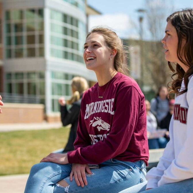 Students Talking On Campus