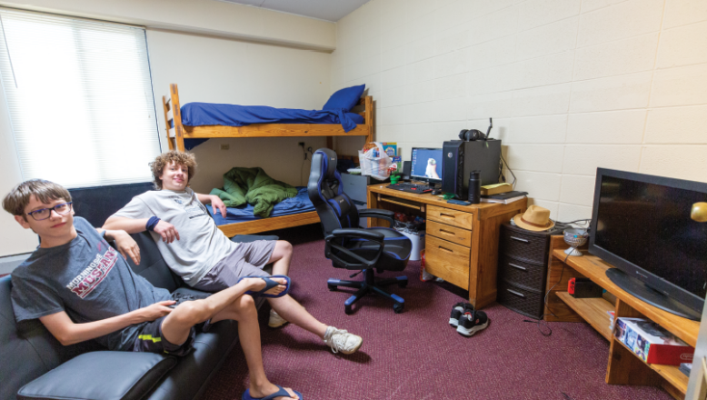 students lounging in the Plex residence hall