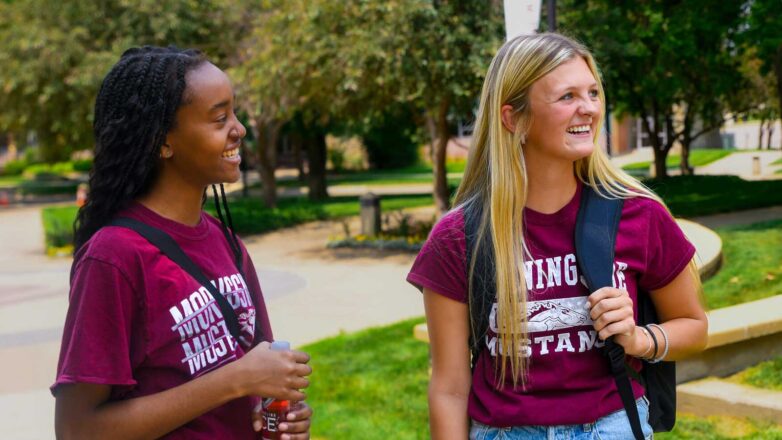 Two Students Smiling