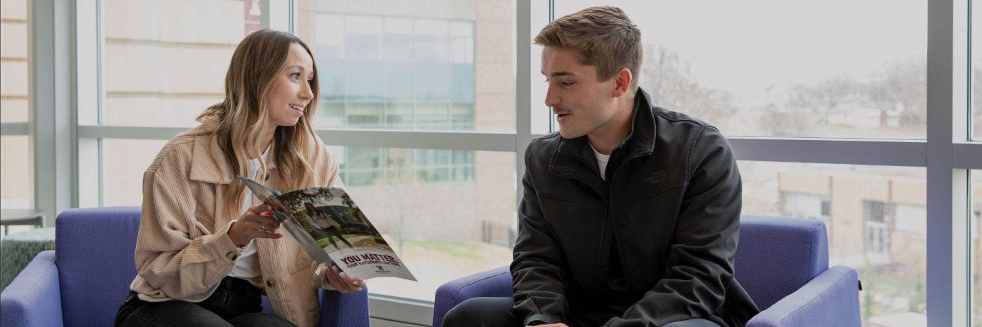 admissions counselor meeting with student