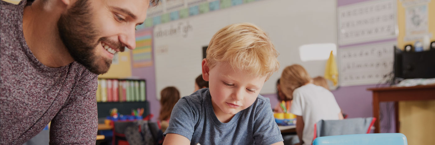 male teacher teaching student