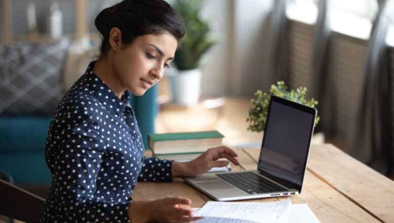 woman on computer studying