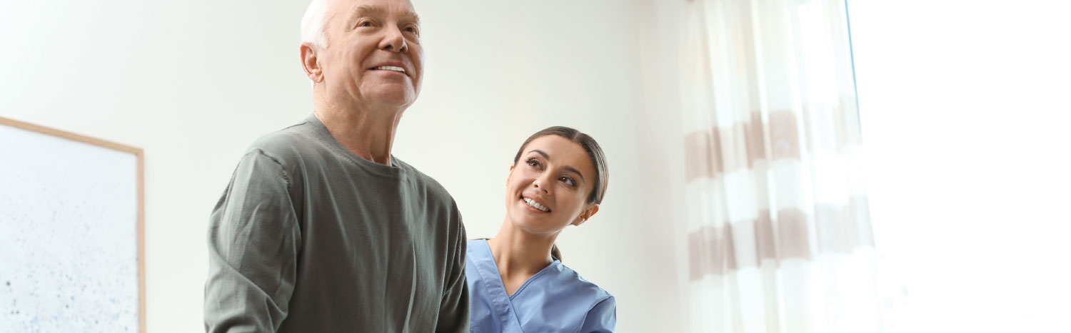 nurse with older patient