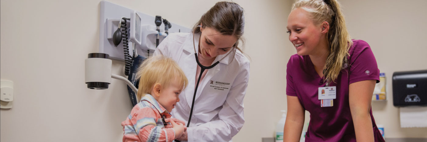 graduate nursing student with patient