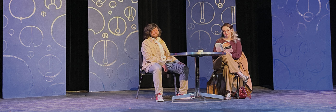 two students performing in a one act play