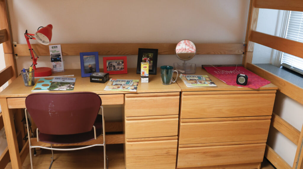 Close up of desk, dresser, and chair in a Dimmitt room.