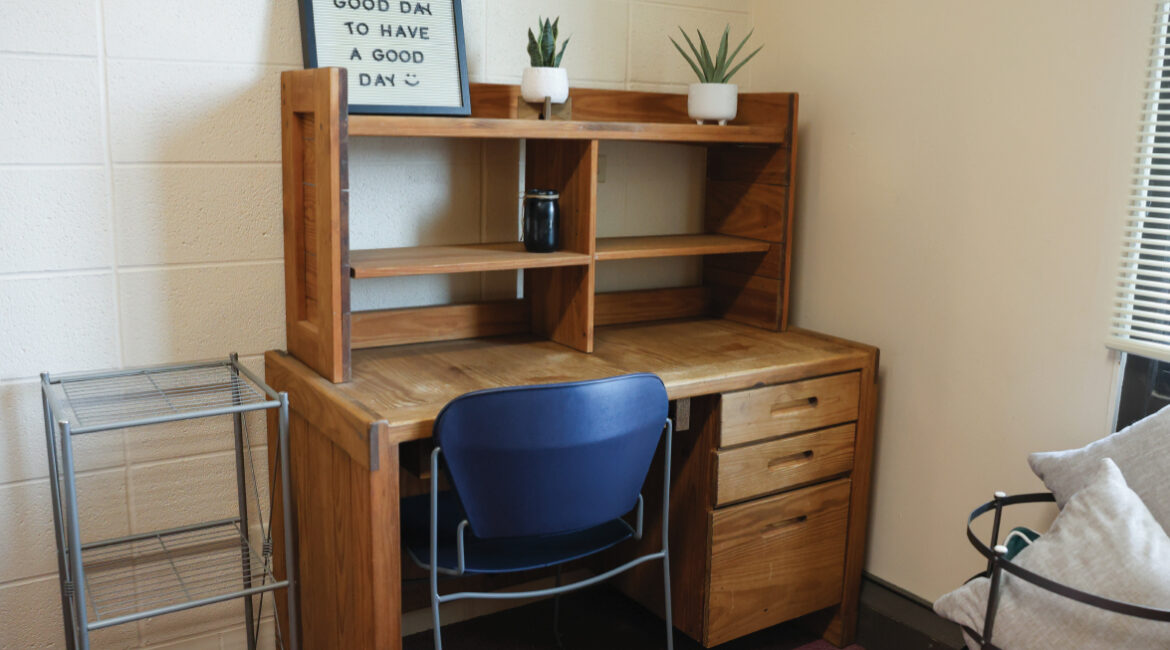 A close up of a desk in a room in the Plex. 