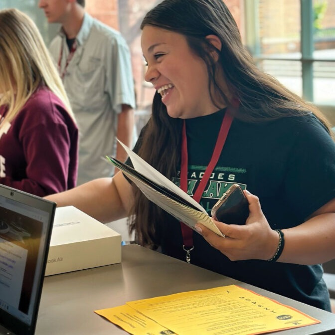 student getting computer