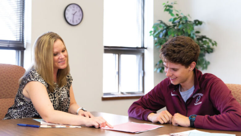 student meeting with financial aid