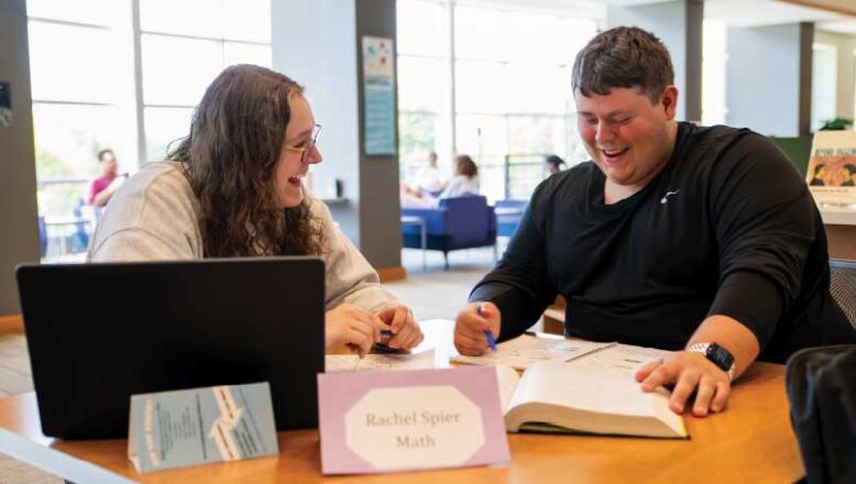 student tutoring another student