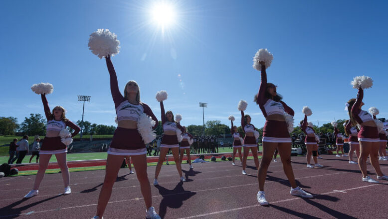 cheerleaders at the football stadium
